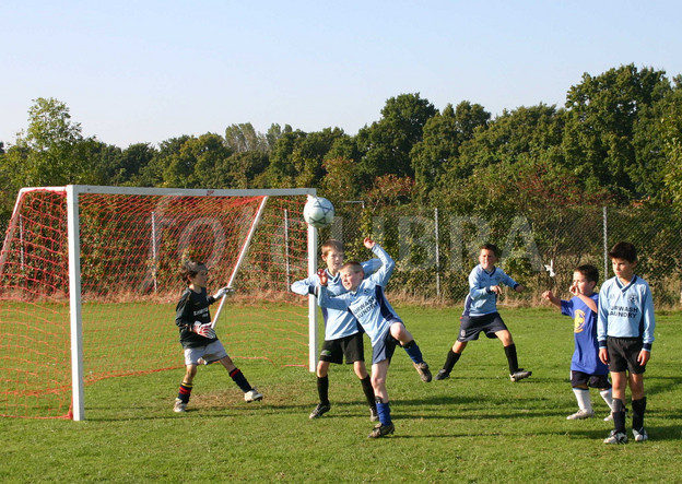 boys playing football