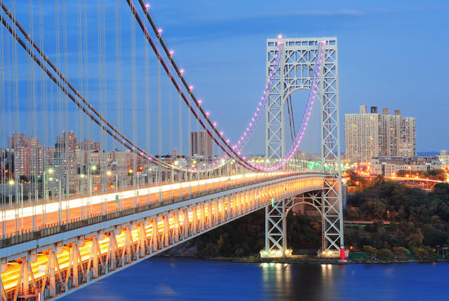 George Washington Bridge at dusk over Hudson River.