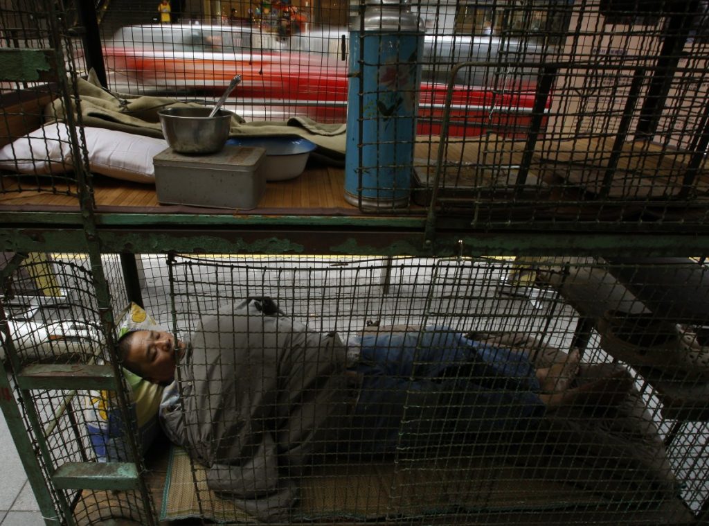 until-the-hong-kong-government-acknowledges-the-danger-of-the-conditions-however-the-best-residents-can-do-is-protest-the-cages-are-where-many-will-live-out-their-remaining-years