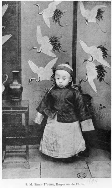 CHT214754 Pu Yi (1906-67) the last Emperor of China, as a child, picture published in 1911 (b/w photo)  by Chinese Photographer, (20th Century); black and white photograph; Private Collection; (add. info.: ruling Emperor of China 1908-11 then non-ruling 1911-24; installed by Japanese as ruler of Manchukuo in 1932); Archives Charmet; Chinese, out of copyright