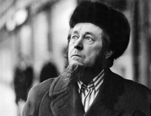 A portrait of Russian author and historian Alexander Solzhenitsyn taken in Cologne before his departure for Zurich 15 February 1974.  Solzhenitsyn was awarded in 1970 the Nobel Prize for Literature.  In his work Solzhenitsyn continued the realistic tradition of Dostoevsky and Tolstoy and complemented it later with his views of the flaws of both East and West. He produced in the 1960s and 1970s a number of major novels based on his experience of Soviet prisons and hospital life. Later he saw that his primary mission is to rewrite the Russian history of the revolutionary period in the multivolumed work "The Red Wheel" (1983-1991).